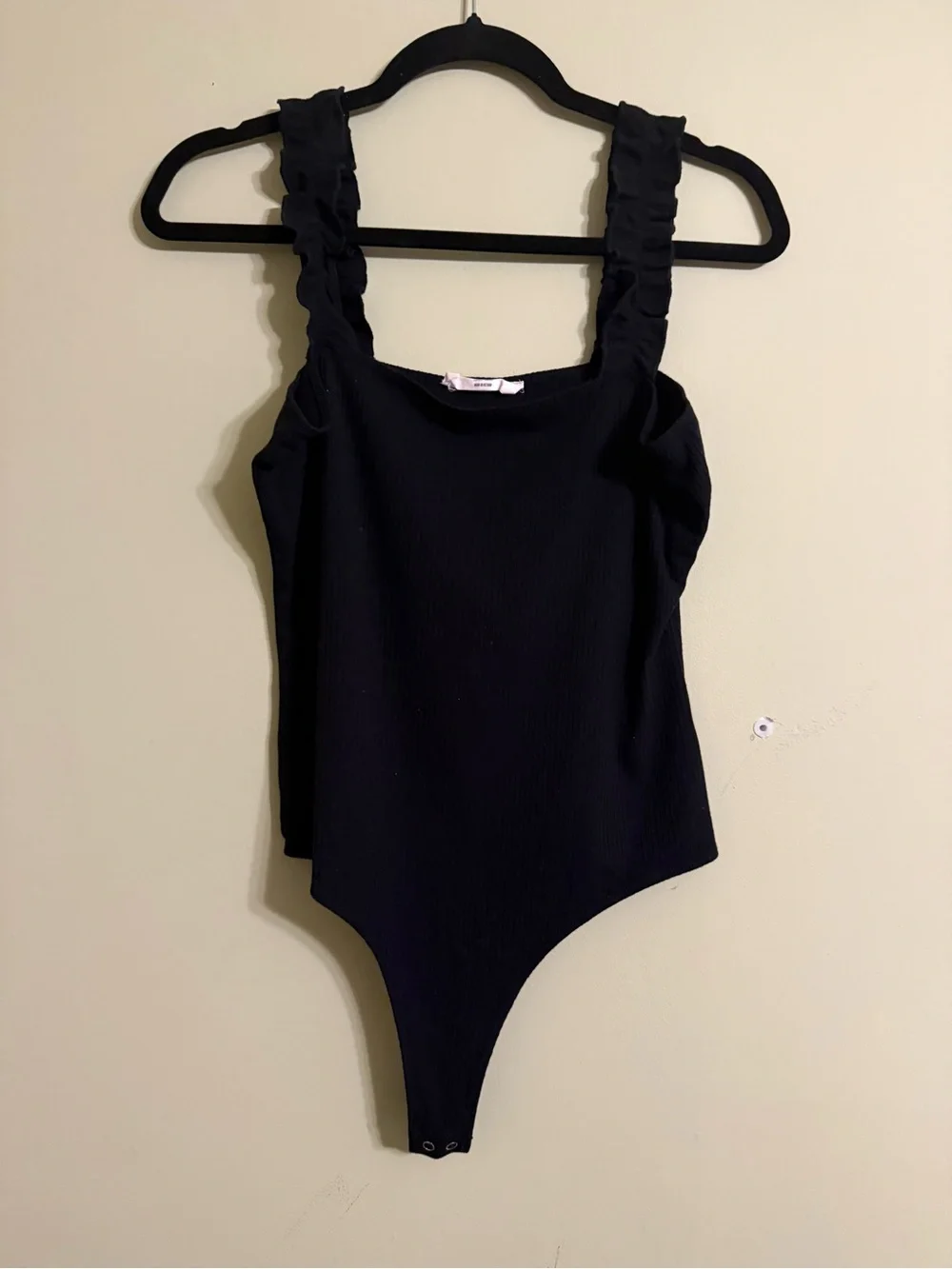 Black Ruffled-Strap One-Piece Bodysuit